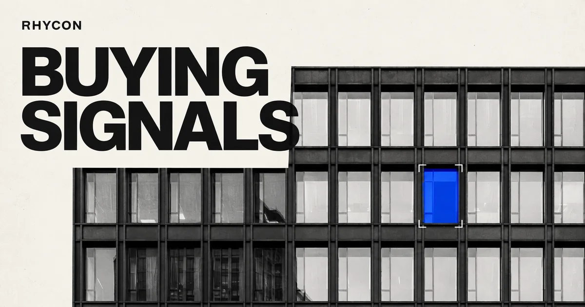 Buying signals: one blue window highlighted in a monochrome office facade.